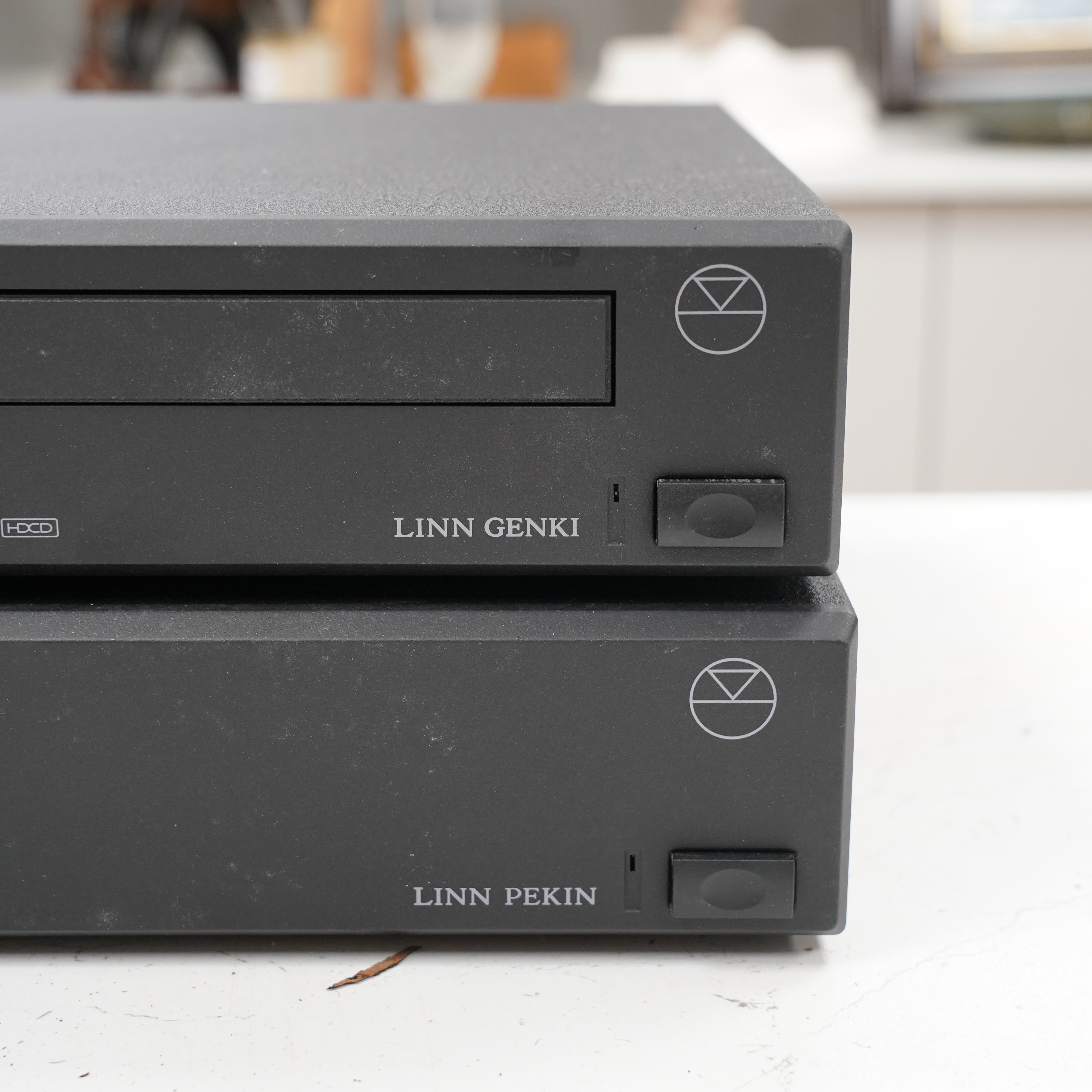 A Linn Pekin tuner, a Linn Genki CD player and three Arcam Alpha 8 Power Amps, with three remote controls, two power cables and instructions for the amplifiers
